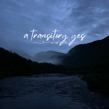 A dark evening picture of three mountains and a river running through the valley. White text says "a transitory yes."